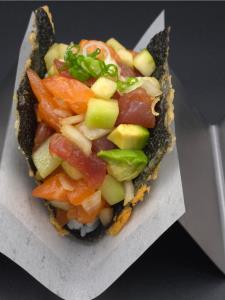 sushi rice, tuna, salmon, cucumber, onion, avocado, shoyu sauce, sesame oil, green onion Typhoon Taco