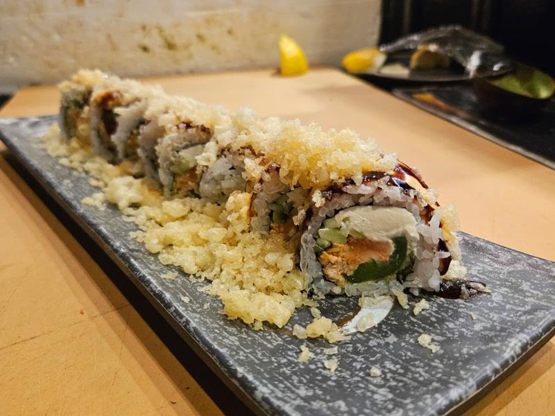 In: Salmon, Jalapeno Tempura, Cream Cheese, Cucumber
Out: Spicy Mayo, Unagi Sauce, Crunch on top Mexican Roll