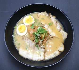 SPICY RAMEN, MADE WITH OUR TONKOTSU BASE BROTH. TOP WITH ONIONS, CABBAGE, BEANS SPROUTS, ZUCCHINI, & EGG. Spicy Tonkotsu Ramen