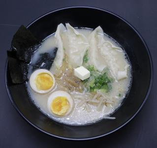 GYOZA, MADE WITH CHICKEN. SERVED WITH TONKOTSU(PORK) BASE BROTH. TOP WITH ONIONS, CORN, BUTTER, NORI, & EGG. Gyoza Tonkotsu Ramen