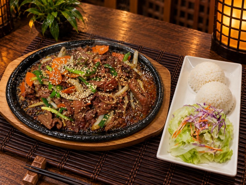 Hot. Served on sizzling plate with white rice and salad. K2_Spicy Pork Bulgogi