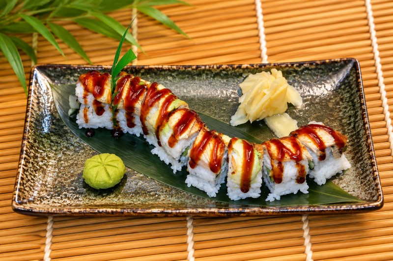 California roll topped with avocado and eel. R14_Dragon Roll