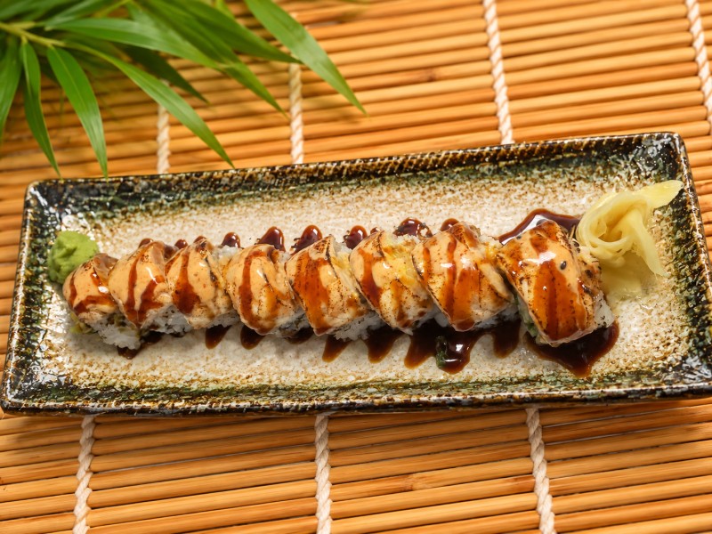 Hot. California roll topped with seared salmon. R19_Bremerton Roll