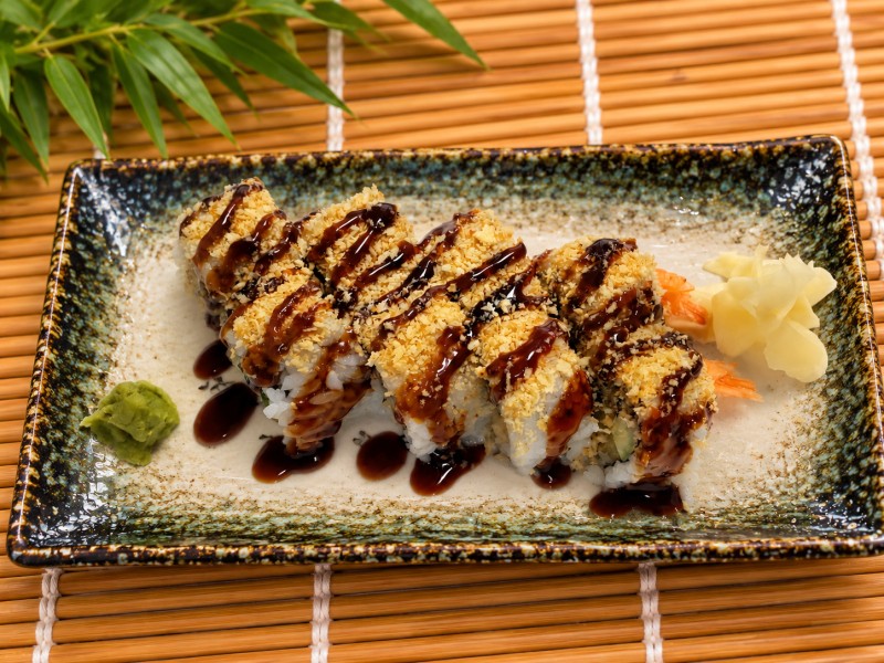 Shrimp tempura roll topped with crunchy and unagi sauce. R21_Crunch Roll