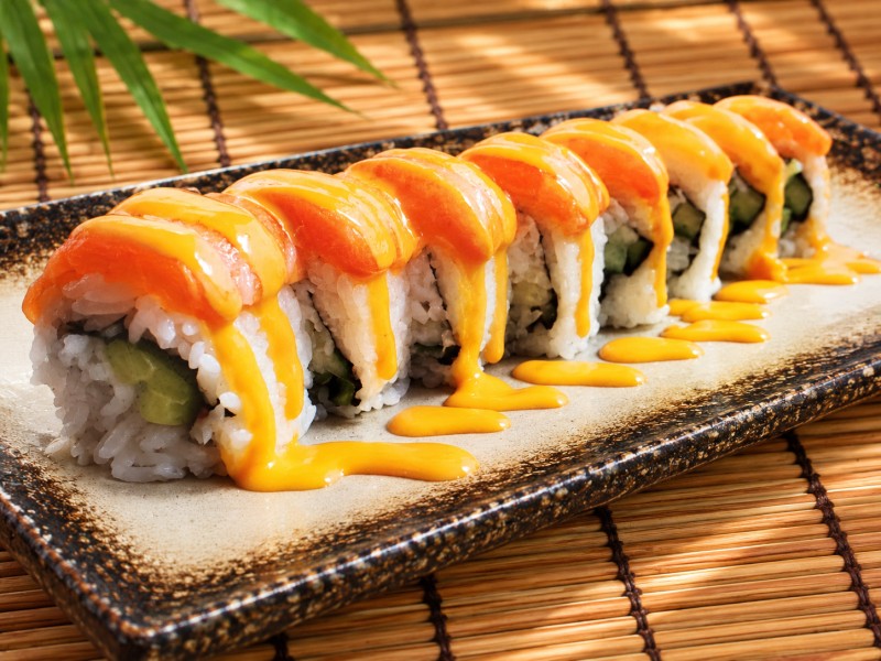 Crab Salad, Avocado, Cuaumber & Salmon on top w/ spicy mayo sauce R30_Sunset Roll
