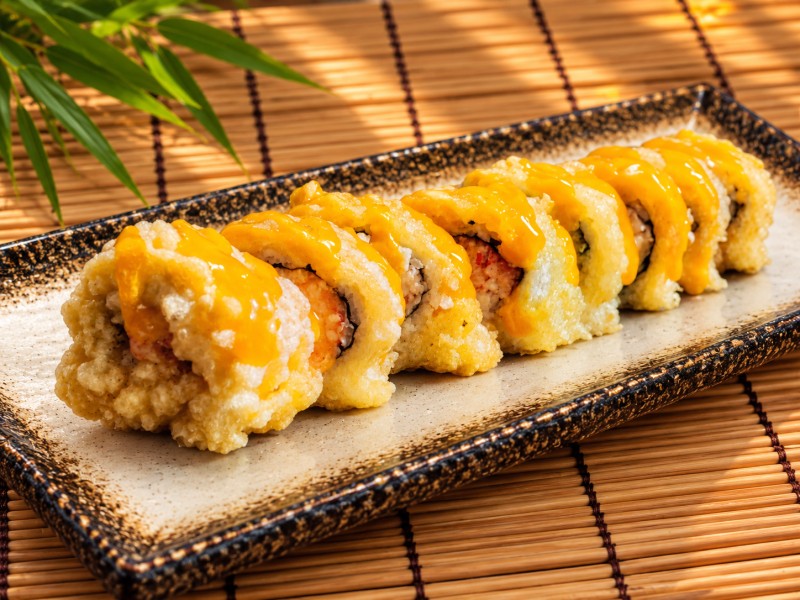 Deep fried, Crab Salad, Avocado, cucumber & House Mango sauce on top w/ parsley R32_Mango Martini Roll - Deep-Fried Roll