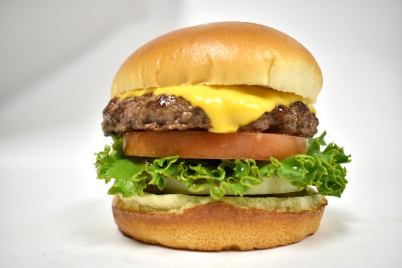 - House sauce, Pickle, Onion, Lettuce, Tomato, American cheese 1/4 Lb. Cheese Burger
