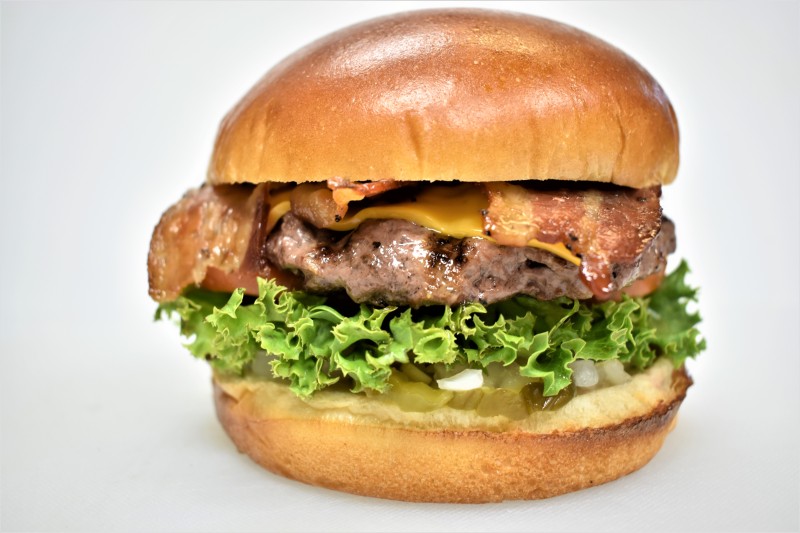 - House sauce, Pickle, Onion, Lettuce, Tomato, American cheese, Bacon
1/3 Lb. Bacon Cheese Burger