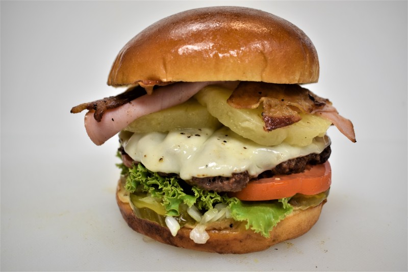 - House sauce, Pickle, Onion, Lettuce, Tomato, Pineapples, Teriyaki sause, Provolone cheese, Ham
Hawaiian Bacon Cheese Burger