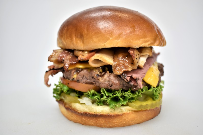 - House sauce, Pickle, Onion, Lettuce, Tomato,Turkey, Pastrami, American cheese
Monster Bacon Cheese Burger