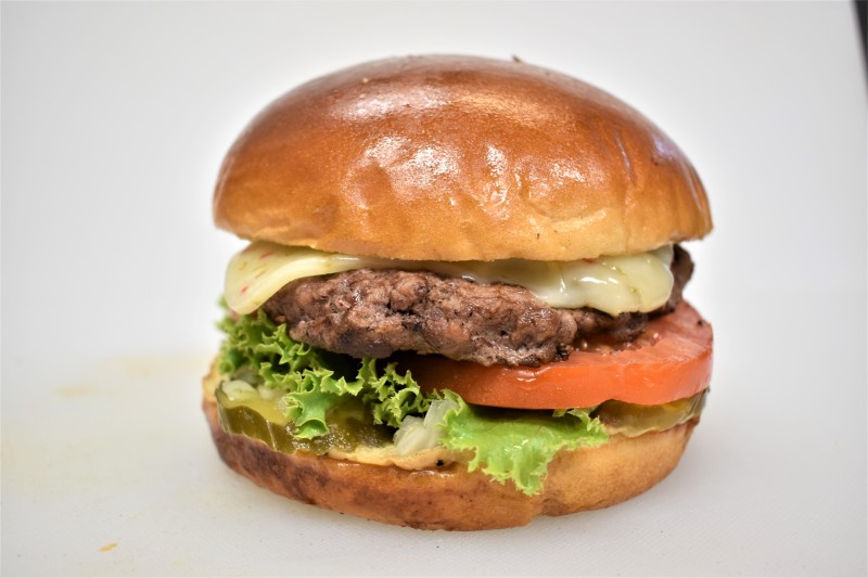 - House sauce, Pickle, Onion, Lettuce, Tomato, Pepper jack cheese
Pepper Jack Cheese Burger