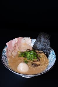 OUR SIGNATURE RAMEN: PORK CHASHU 2PCS
SEASONED BAMBOO SHOOTS,
BLACK MUSHROOMS, CORN, SHREDDED GREEN
ONIONS, SEASONED EGG
Original Tonkotsu Ramen