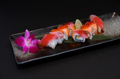 In: Crabmeat, Avocado, Shrimp Tempura
Out: Tuna, Salmon
Sauce: Ghost Chili Pepper Sauce
The Grim Reaper Roll