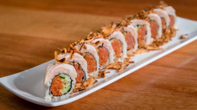 In: Spicy tuna, Cucumber
Out: Albacore tuna
Top: Garlic ponzu, Deep fried onion
 Albacore Delight