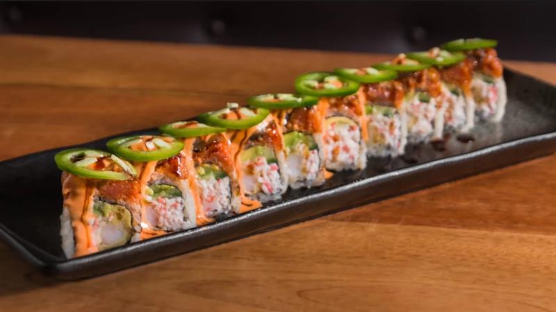 In: Fried shrimp, Crab meat, Avocado
Out: Spicy tuna, Unagi(eel)
Top: Eel sauce, Spicy mayo, Jalapeno
 American Roll