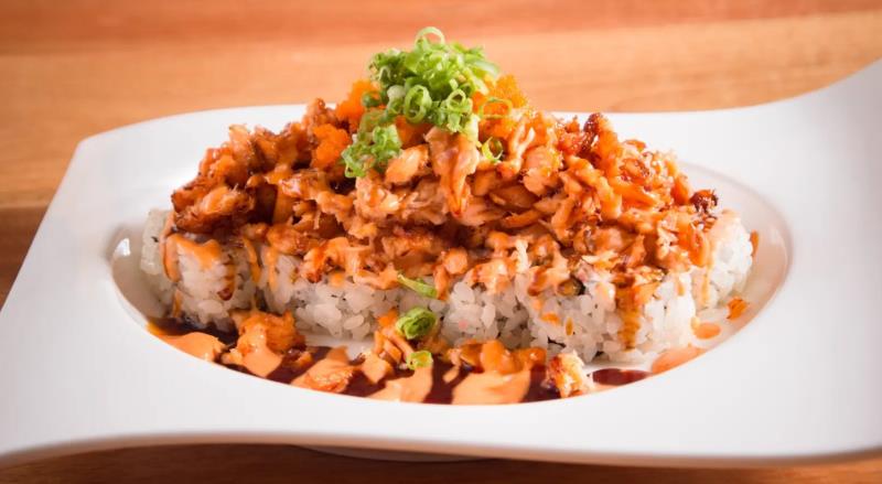 CRAB MEAT, AVOCADO, CUCUMBER / BAKED SALMON, MASAGO, GREEN ONION, EEL SAUCE, SPICY MAYO ON TOP
 Baked Salmon