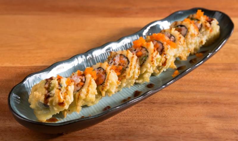 In: Crab meat, Avocado -> Fry
Top: Eel sauce, Masago
 Golden California
