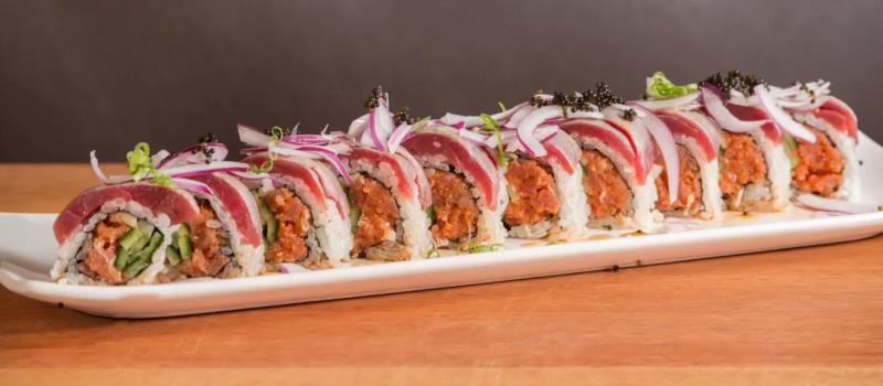 In: Spicy tuna & cucumber
Top: Seared bluefin tuna, red
onion, green onion & tobiko
Sauce: Garlic ponzu In-N-Out