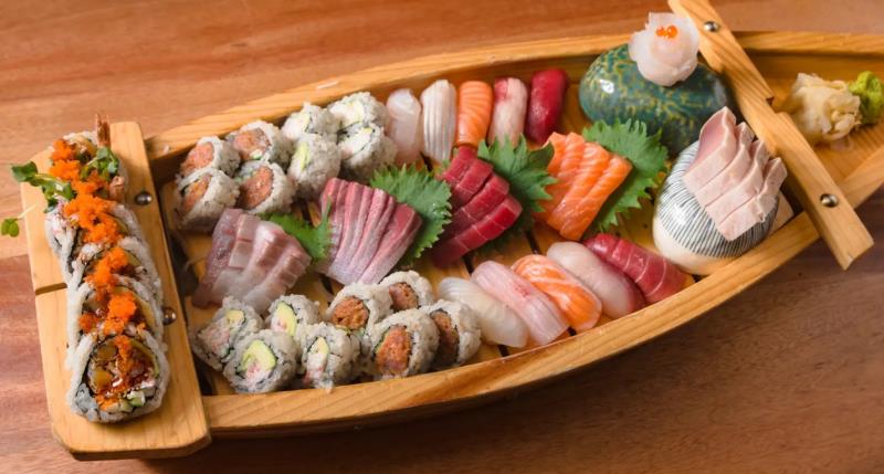 24pcs Sashimi, 10pcs Nigiri, California roll, Spicy Tuna roll & Shrimp Tempura roll Love Boat