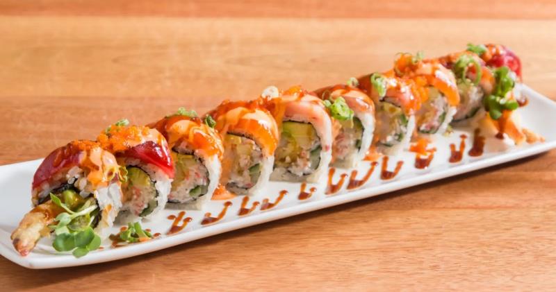 FRIED SHRIMP, CRAB MEAT, CUCUMBER, AVOCADO, KAIWARE / SALMON, TUNA, WHITE FISH, MASAGO, GREEN ONION, SPICY MAYO, EEL SAUCE, SRIRACHA ON TOP
 Super Star