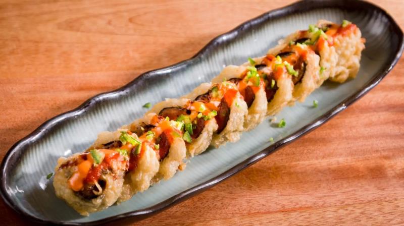 SPICY TUNA, DEEP FRIED JALAPENO/ EEL SAUCE, SPICY MAYO, SRIRACHA ON TOP
 Tsunami