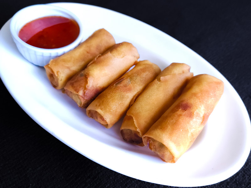 5 pieces of crispy fried veggie egg rolls served with spicy sauce Veggie Egg Rolls (5Pc)