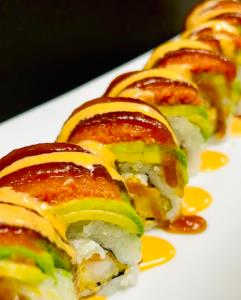 In - crab mix, shrimp tempura, avocado. Top- spicy tuna, eel sauce
Hot Night Roll