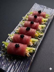 NO Rice, 6pcs seared tuna with crab meat, avocado, mango, asparagus, black tabiko, alfalfa Tuna Huggie Roll