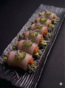 No Rice, 6pcs yellow tail with spicy yellow tail, avocado, cucumber, jalapeno, red onion, alfalfa Yellow Tail Huggie Roll