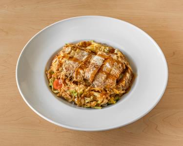 A bowl of rice topped with sauteed spicy pork. Katsu Donburi