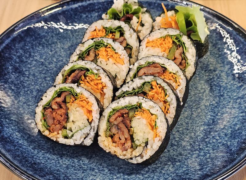 pork, low carrot, green leaves, perilla leaves, pickled radish, Jalapeño Pork Bulgogi Kimbob