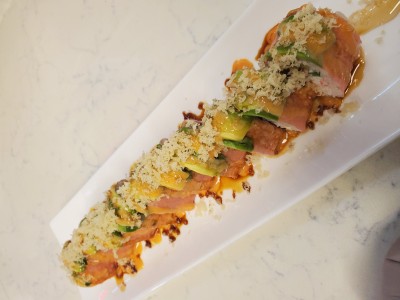 Crab,jalapeno,tuna,asparagus,soy paper,avocado,eel sauce,spicy mayo,crunch &honey S. L. Bees