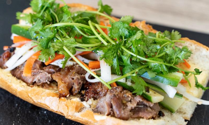 Marinated grilled pork with house mayo, pickled carrots & daikon, cucumber, cilantro, jalapeno, and scallions. Banh Mi Thit Nuong (Grilled Pork)