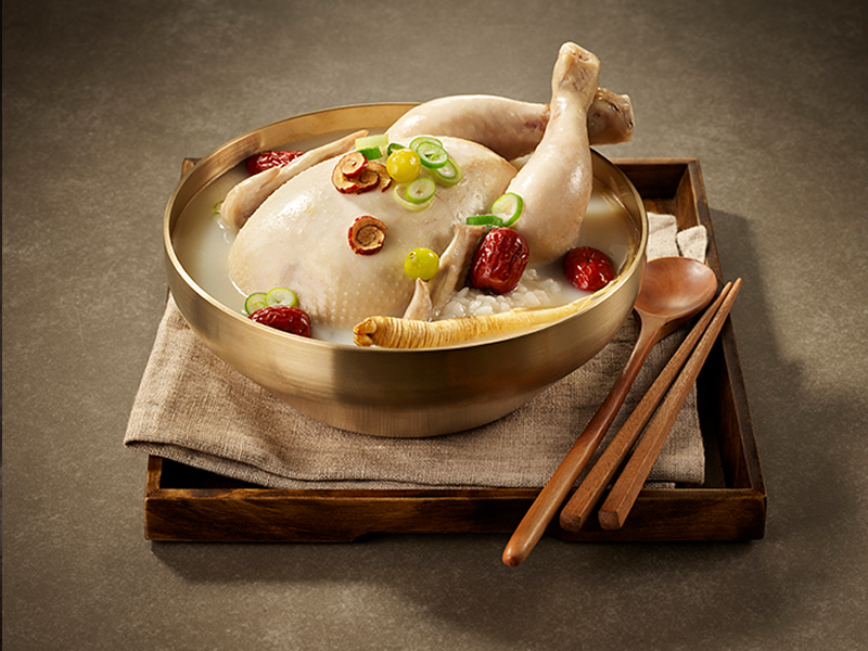 Traditional Korean whole chicken soup simmered with ginseng, green onion, garlic, and egg — nourishing and flavorful. Samgye Tang