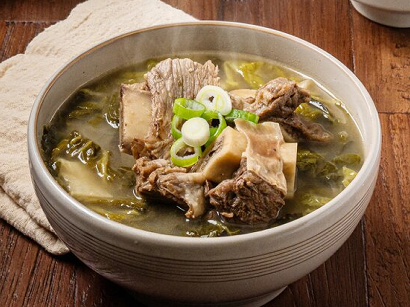 Beef short rib soup simmered with leafy greens and radish for a deep, rich flavor — hearty and nourishing. Galbi Tang W/leafy Green