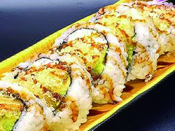 In : Crabmeat, Salmon Tempura, Avo, Cucumber / Out : Crunch, Eel Sauce Salmon Tempura Roll