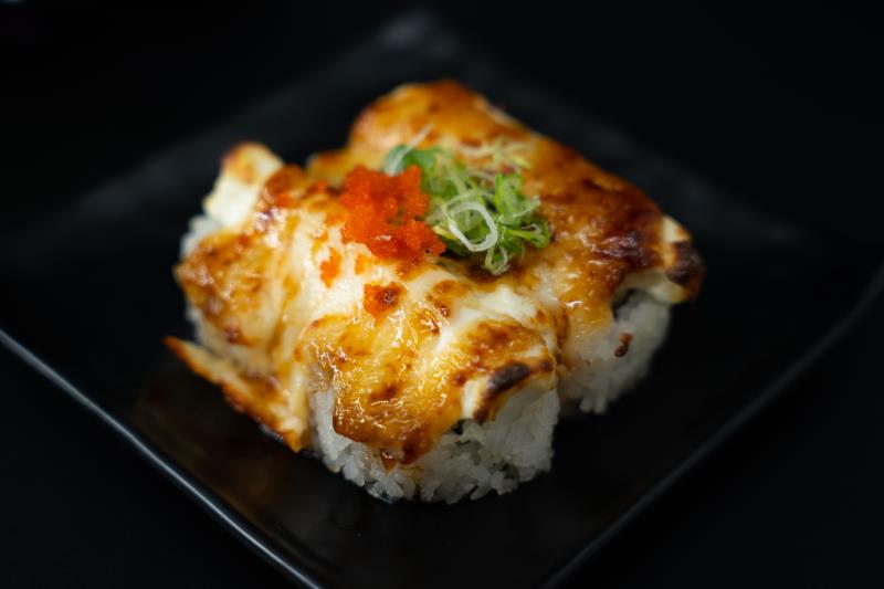 In:Avocado, Krabmeat| Out: Baked Cream Cheese, Mozzarella Cheese| Top: Eel Sauce, Masago, Green Onion
Baked Cheese