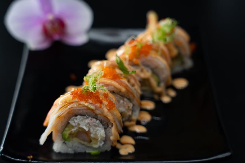 In: Shrimp tempura, krabmeat, avocado | Out: Shredded krabmeat | Top: Eel Sauce, sp. mayo, masago, tempura flake Crab Oh Crab