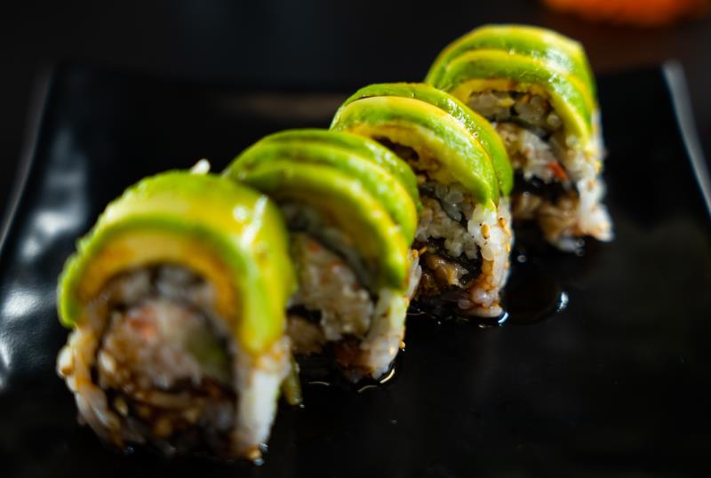 In: Eel, krabmeat, cucumber | Out: Avocado | Top: Eel Sauce Caterpillar