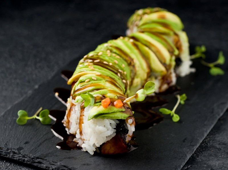 Eel, Cucumber inside. Avocado on top. Eel Sauce on top. Caterpilar Roll