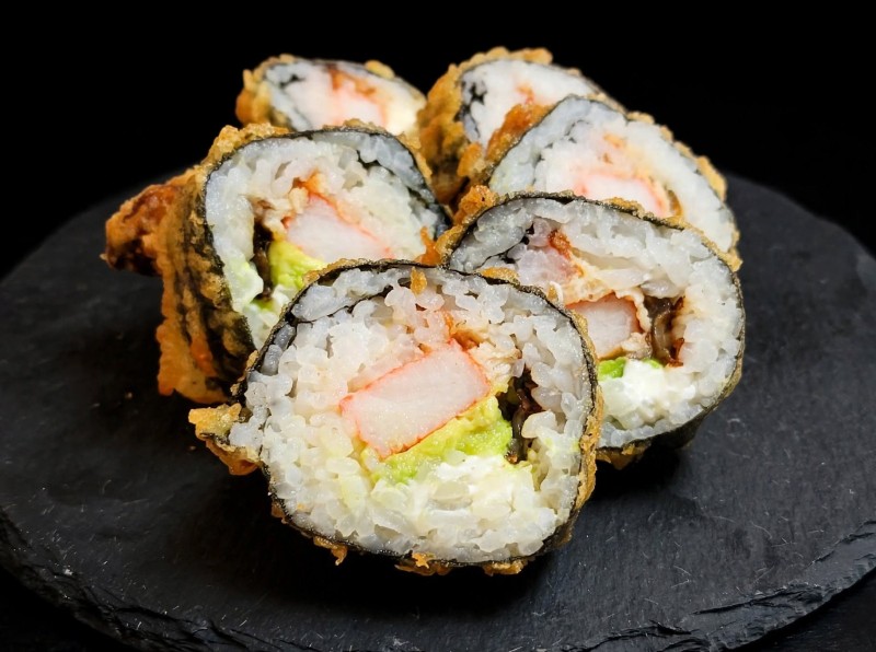 Eel, Crab, Cream Cheese, Avocado inside. Deep Fried. Eel Sauce. Las Vegas Roll