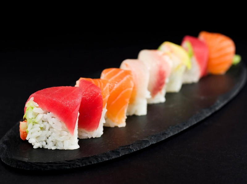 California Roll with Tuna, Yellowtail, Salmon, Shrimp, Avocado on top Rainbow Roll