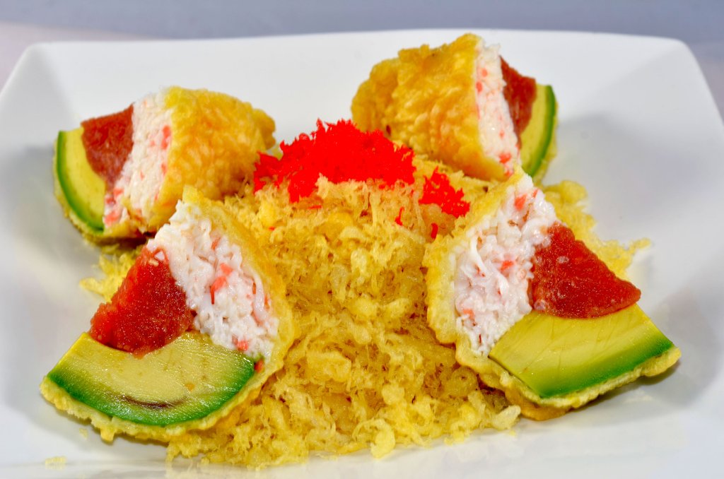 Spicy Tuna and Crab Wrapped in Avocado and Deep Fried w/ Sweet sauce and Spicy Sauce and Fish Egg Monkey Brain